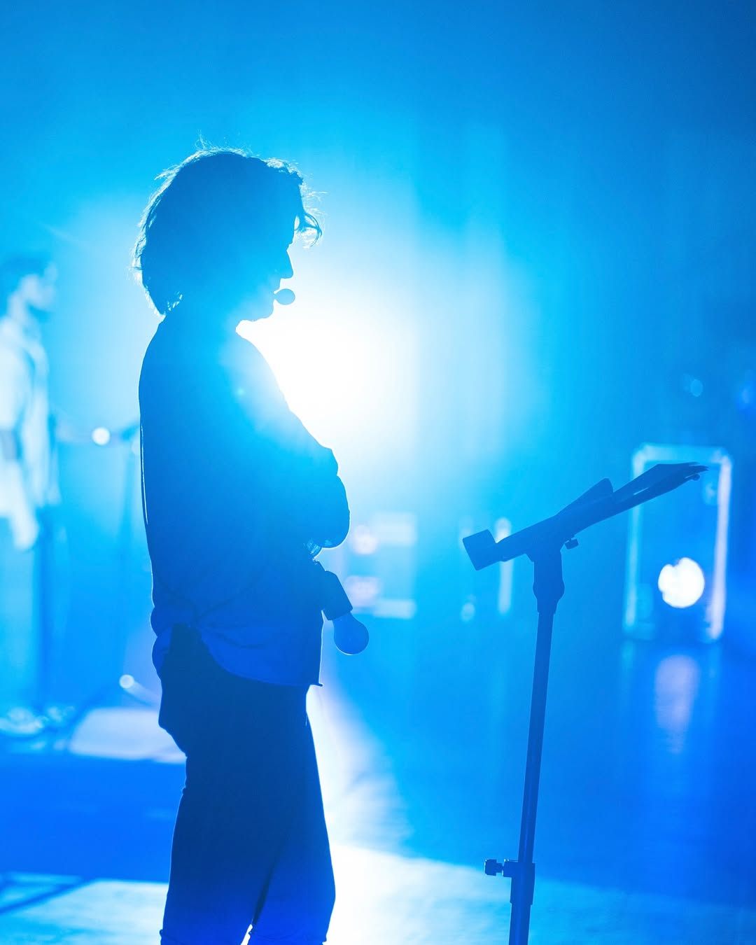 Planetaria — performer silhouette, blue backlight