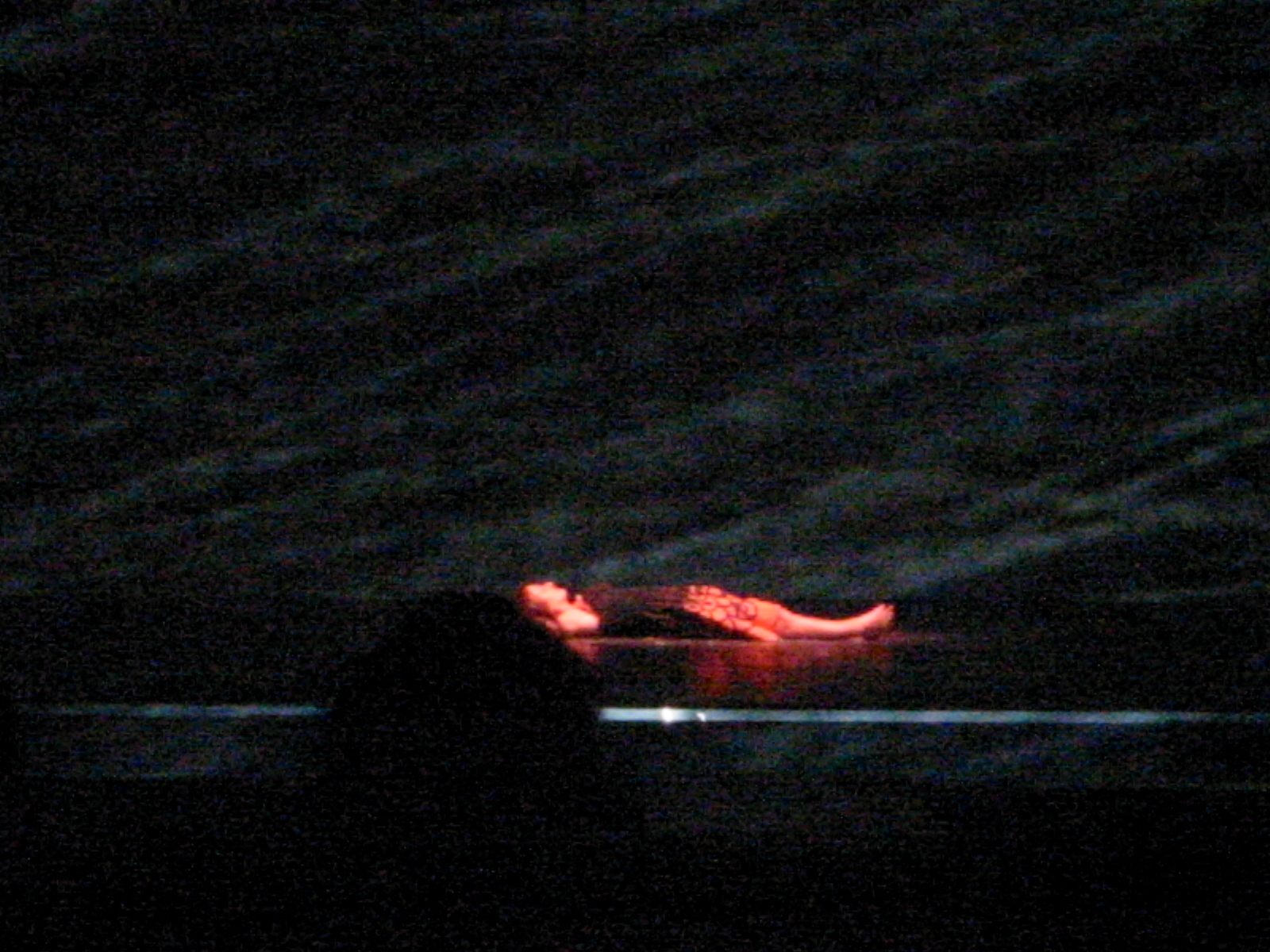 Variazioni sul Cielo &mdash; red floating figure in cosmic space